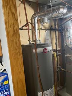 picture of gray water heater installed by a plumber